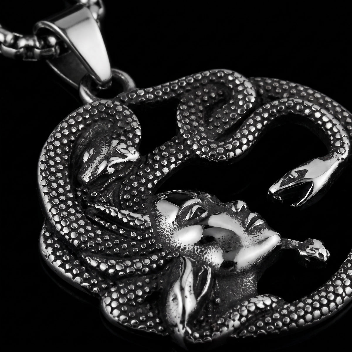 Macro close-up of the Medusa pendant in 316L stainless steel, Outlaws Amsterdam