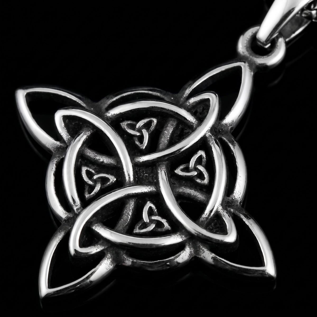 Macro close-up of the Valknut Cross pendant in 316L stainless steel, Outlaws Amsterdam