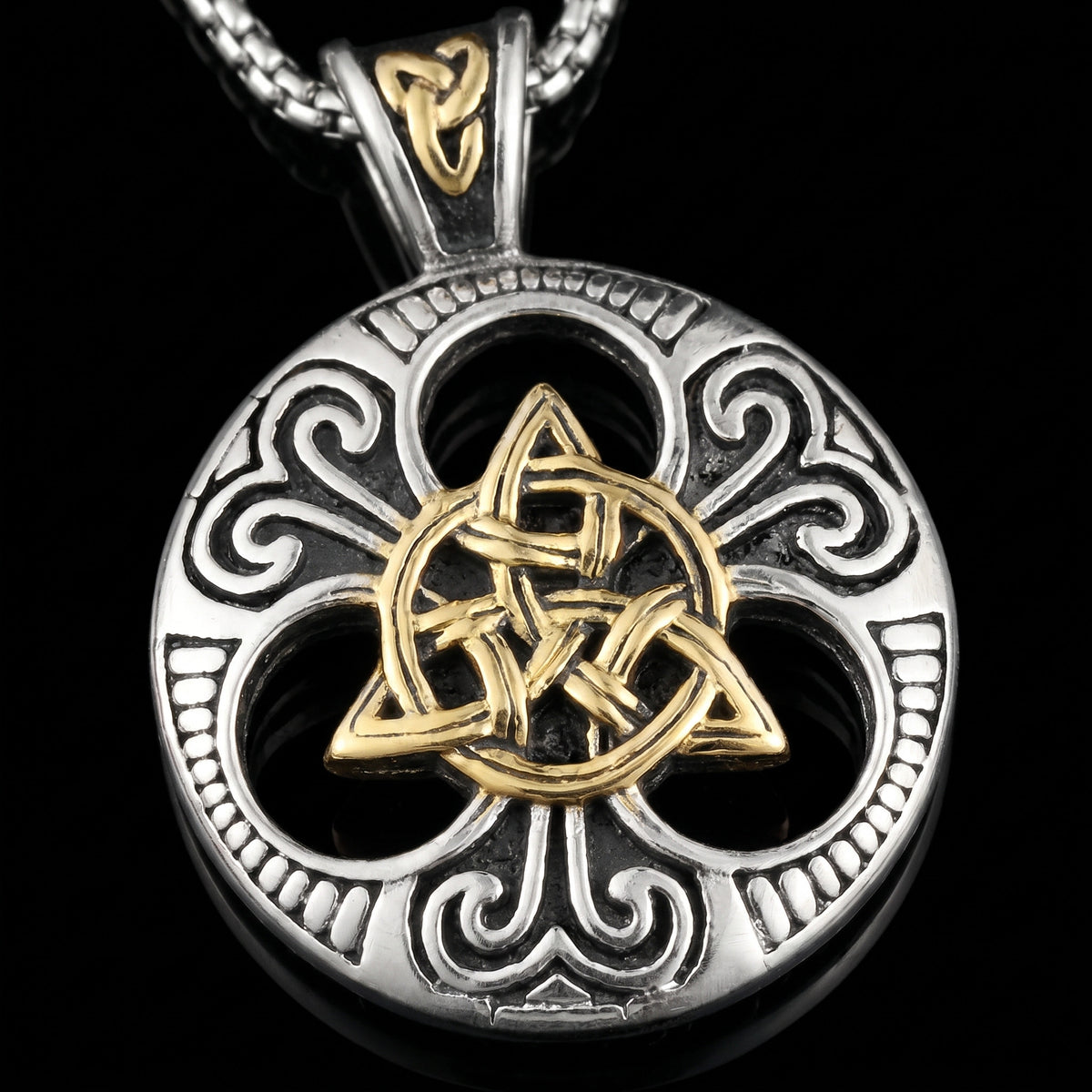 Macro close-up of the Golden pendant in 316L stainless steel, Outlaws Amsterdam