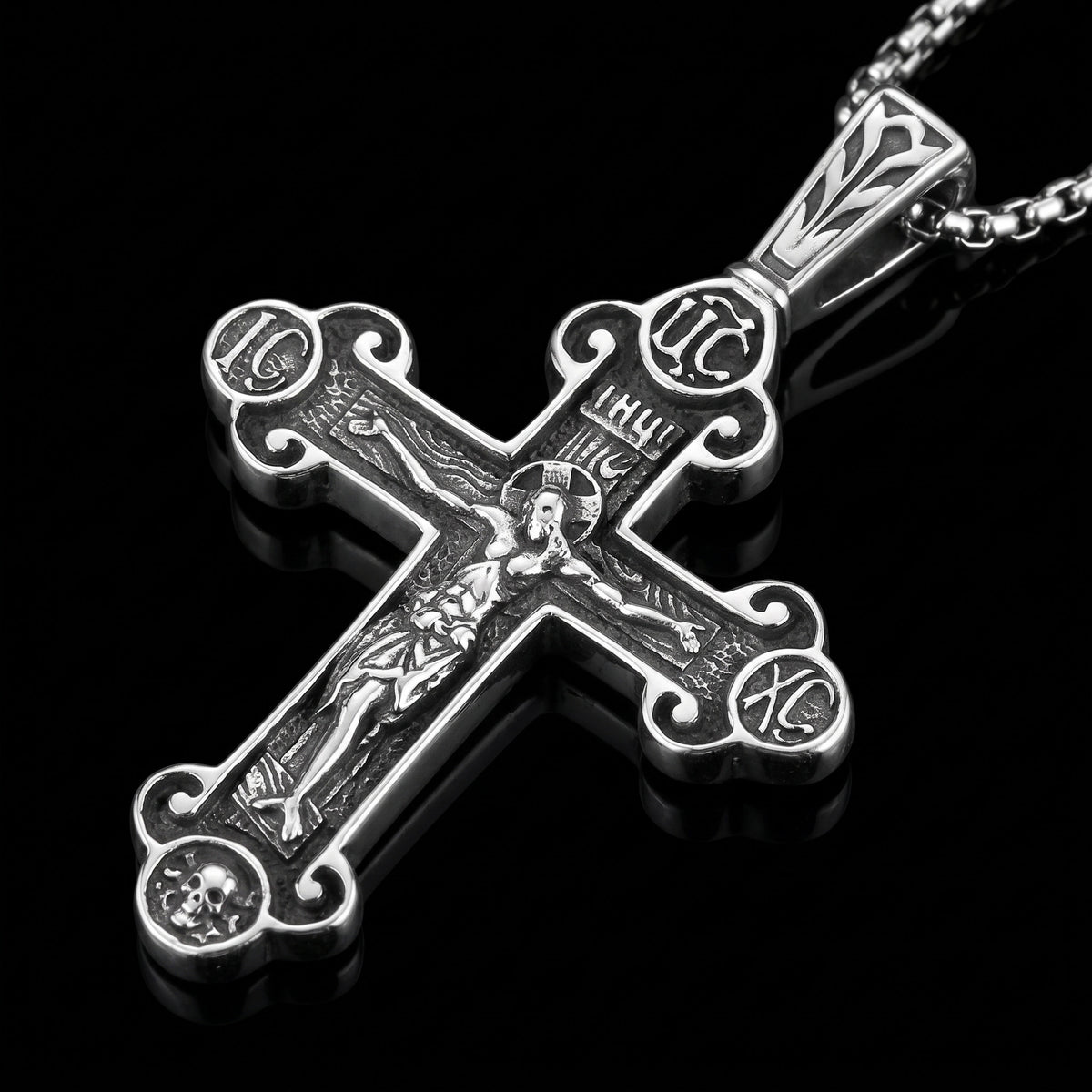 Macro close-up of the Holy Cross pendant in 316L stainless steel, Outlaws Amsterdam