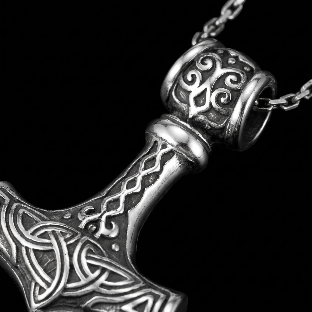 Macro close-up of the Mjolnir pendant in 316L stainless steel, Outlaws Amsterdam