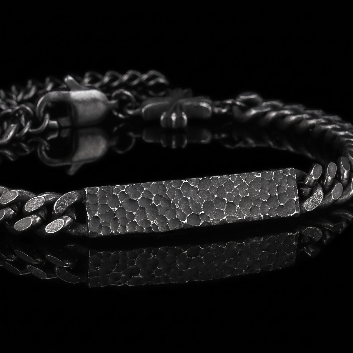 Macro close-up of the Sacred Secret bracelet in 316L stainless steel, Outlaws Amsterdam