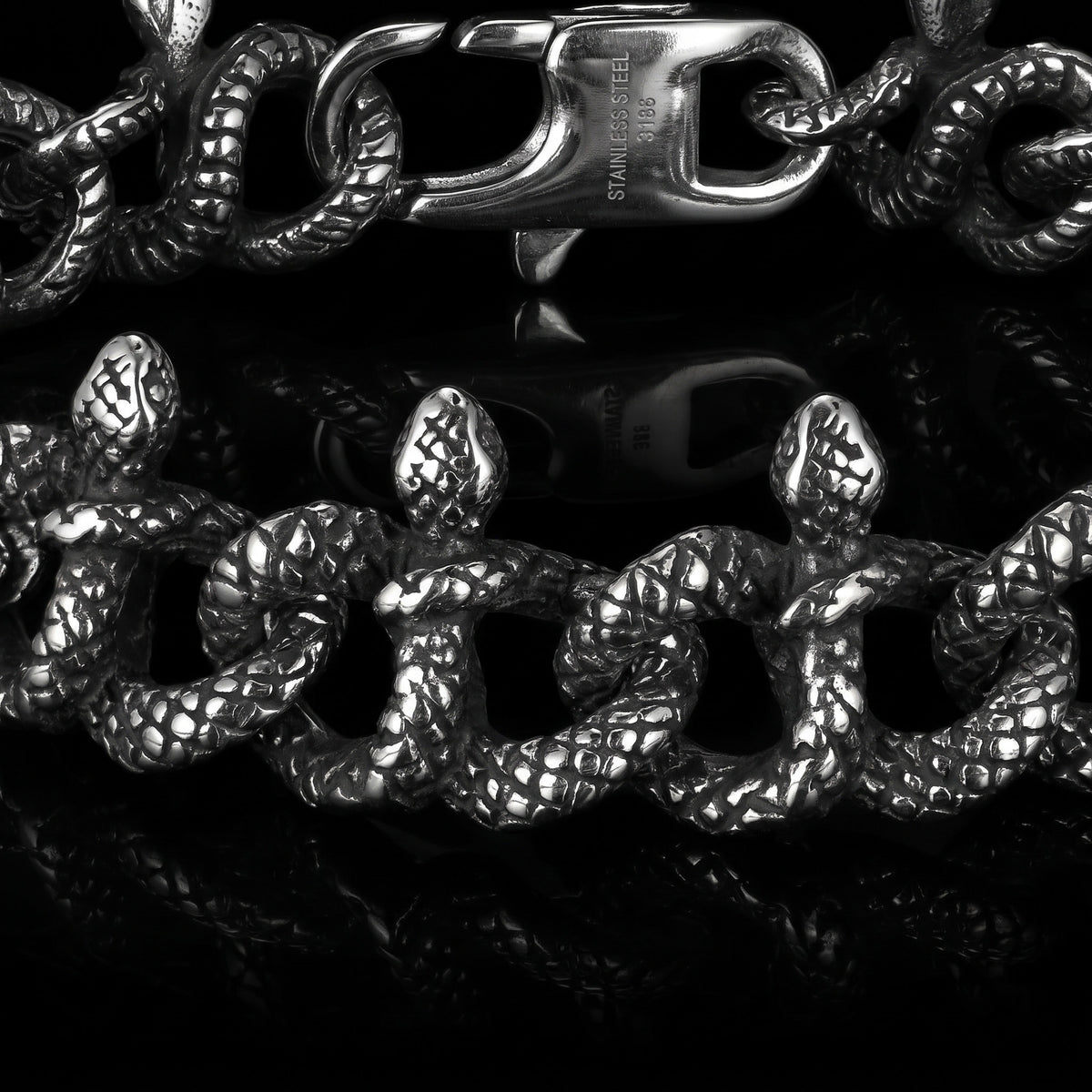 Macro close-up of the Serpent Union bracelet in 316L stainless steel, Outlaws Amsterdam