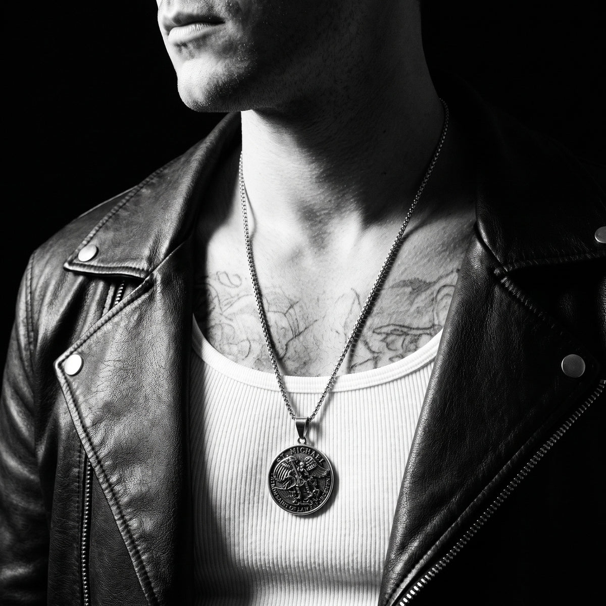 Man wearing the St. Michaels pendant on a chain, worn on the chest, 316L stainless steel, Outlaws Amsterdam
