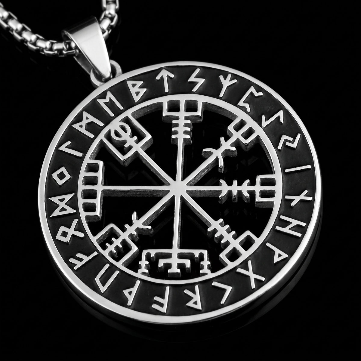 Macro close-up of the Vegvisir pendant in 316L stainless steel, Outlaws Amsterdam