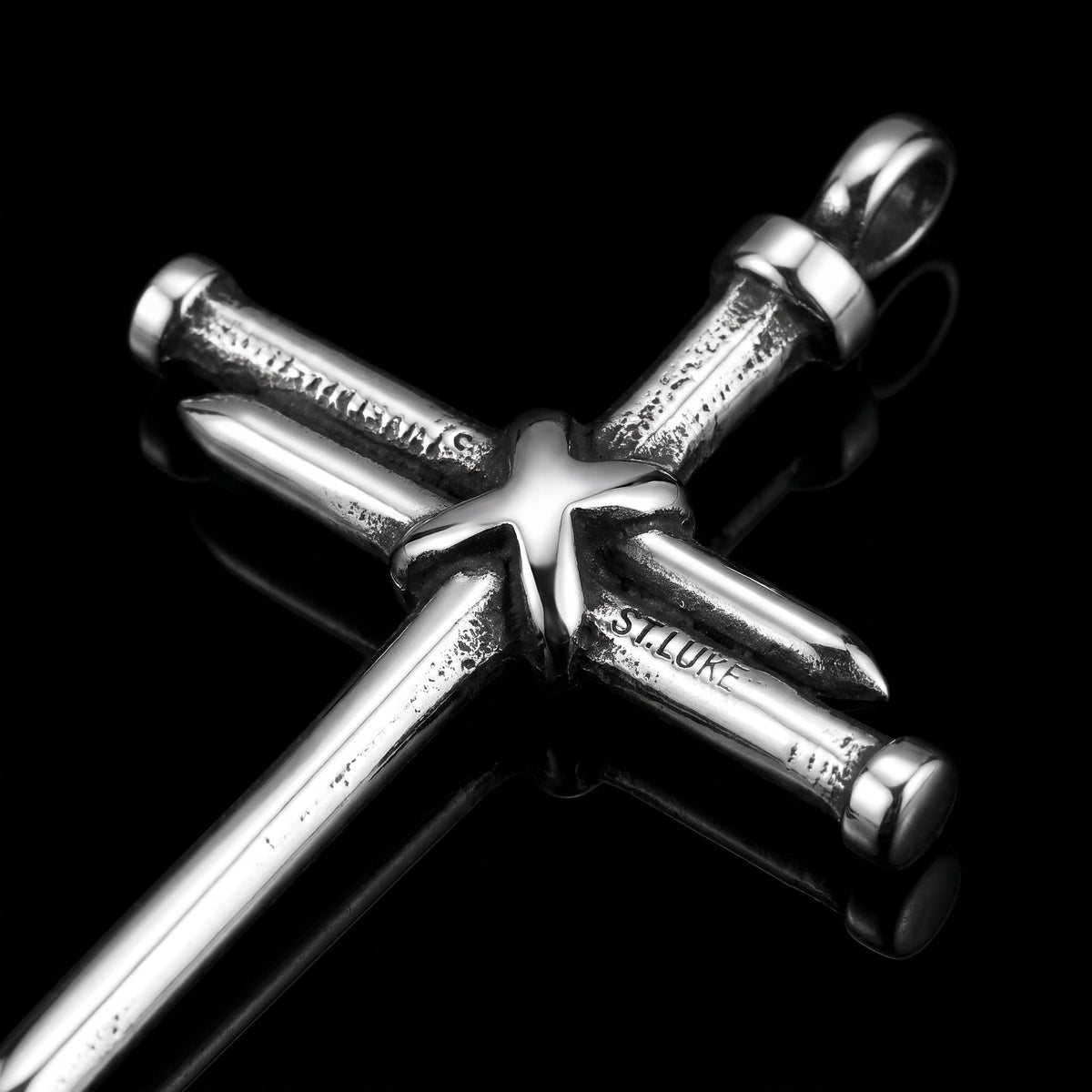 Macro close-up of the Wooden Cross Ii pendant in 316L stainless steel, Outlaws Amsterdam
